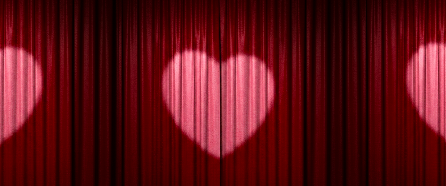 A dramatic red stage curtain with a glowing pink heart-shaped light projected in the center, perfect for romantic movie nights, Valentine’s Day theater events, or wedding stage backgrounds